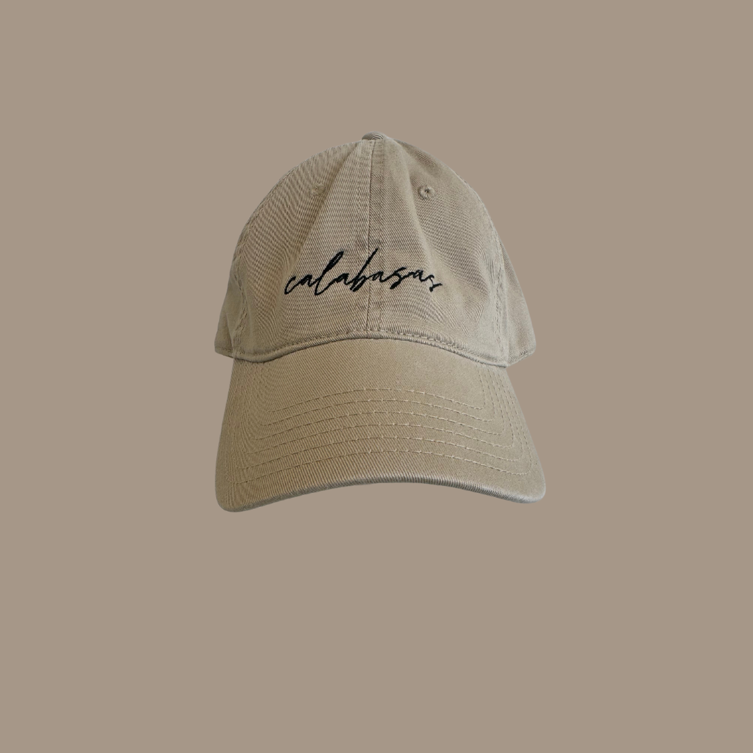 Dad hat with the words "Calabasas" embroidered on the front.