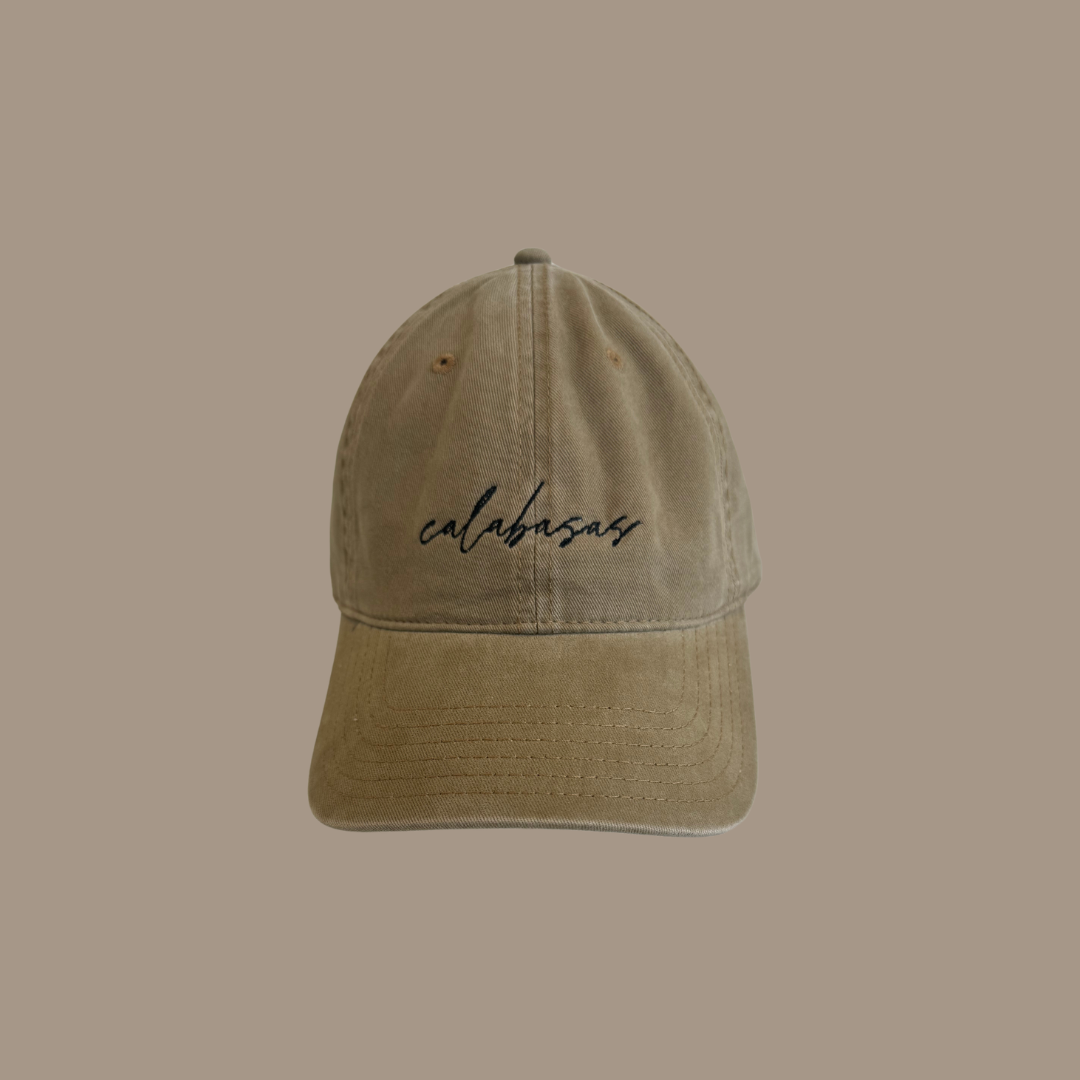 Dad hat with the words "Calabasas" embroidered on the front.