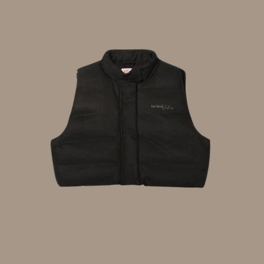 Crop puffer with "be kind studios" embroidered on front